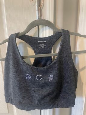 Peloton Women's Dark Charcoal Racerback Sports Bra with Peace-Heart Logo